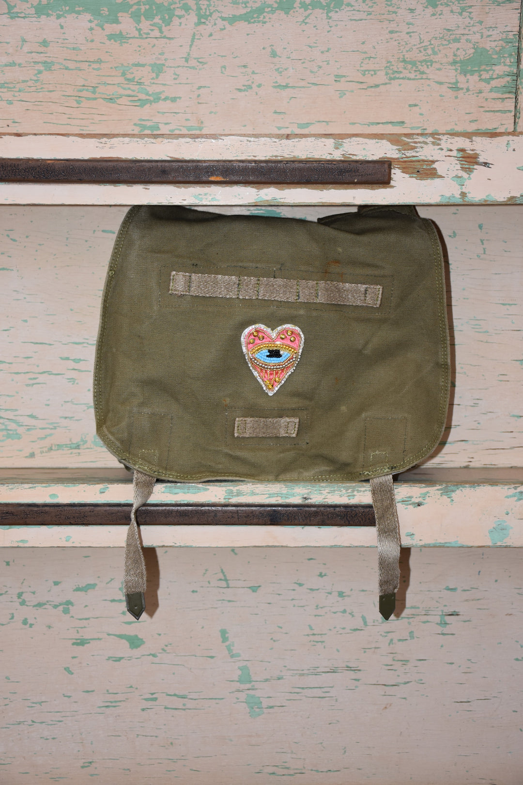 EVIL EYE HEART CROSSBODY BAG